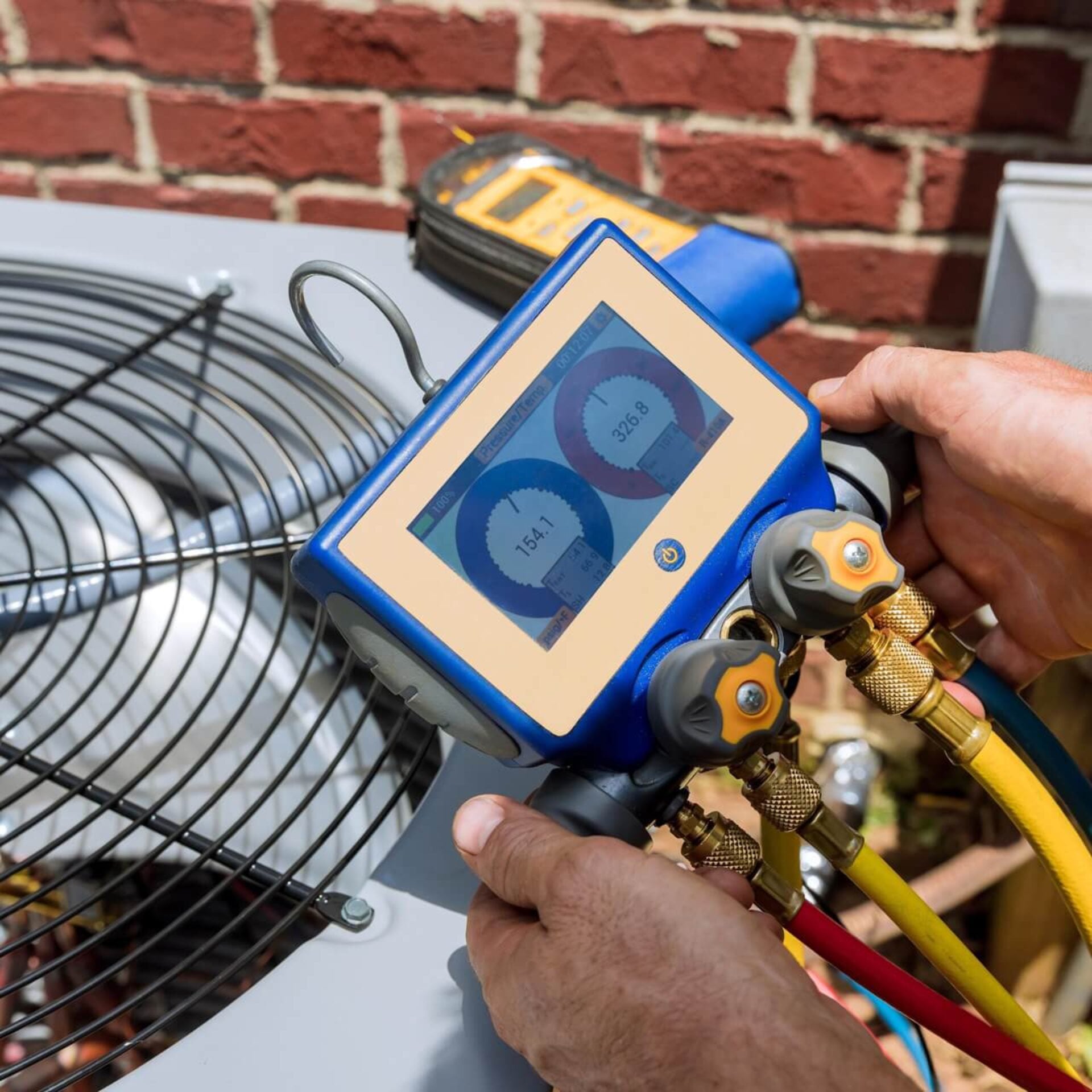 HVAC Technician Conduction Routine Maintenance